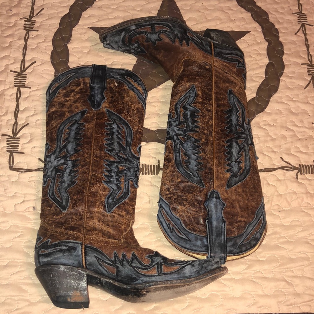 Brown and black distressed boots